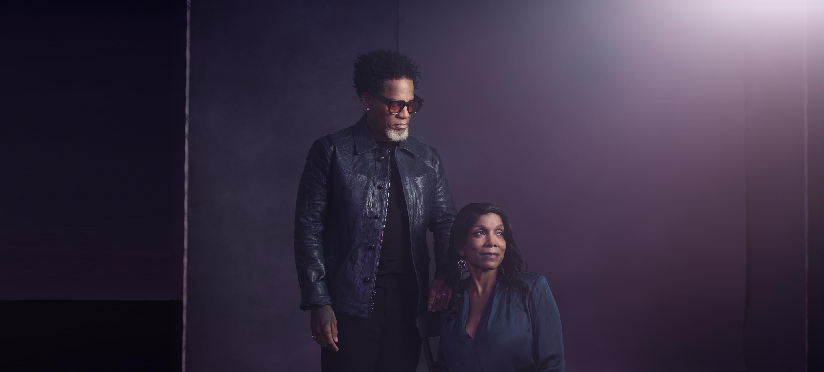 DL. Hughley & black woman looking down image