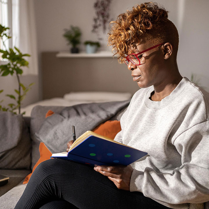 Black women reading a book